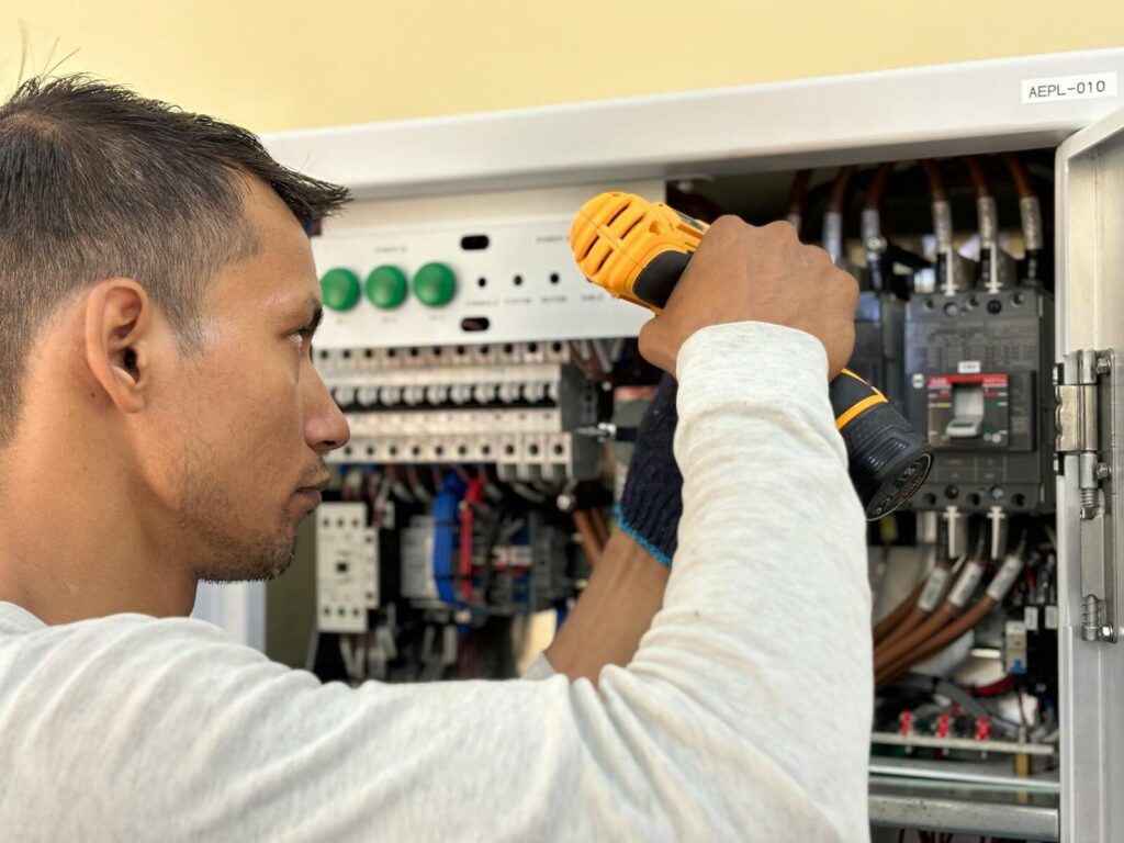 Professional electrician providing electrical services